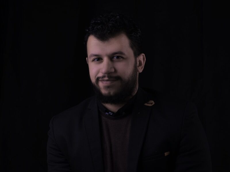 man in black suit jacket