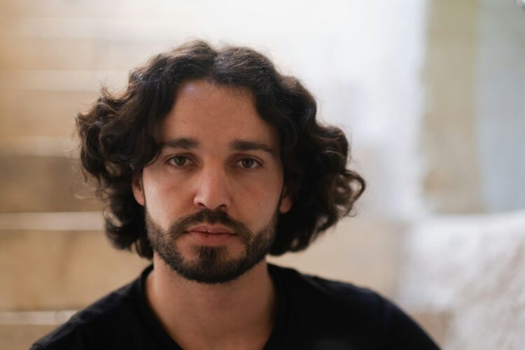 a man with curly hair