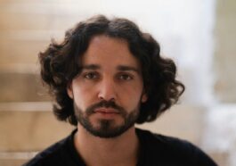 a man with curly hair