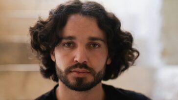 a man with curly hair