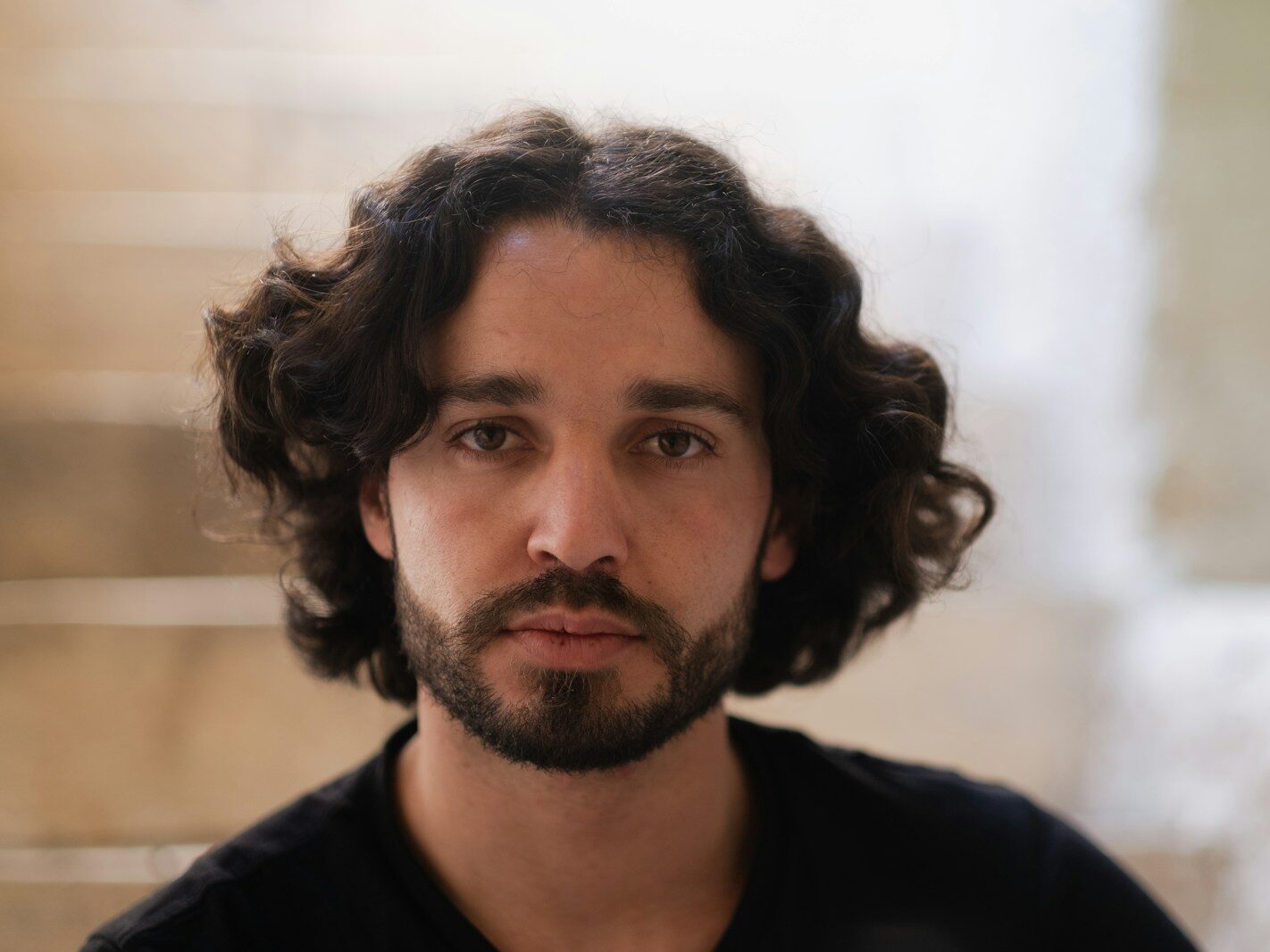 a man with curly hair