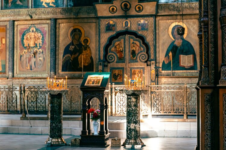 a church with a large painting on the wall