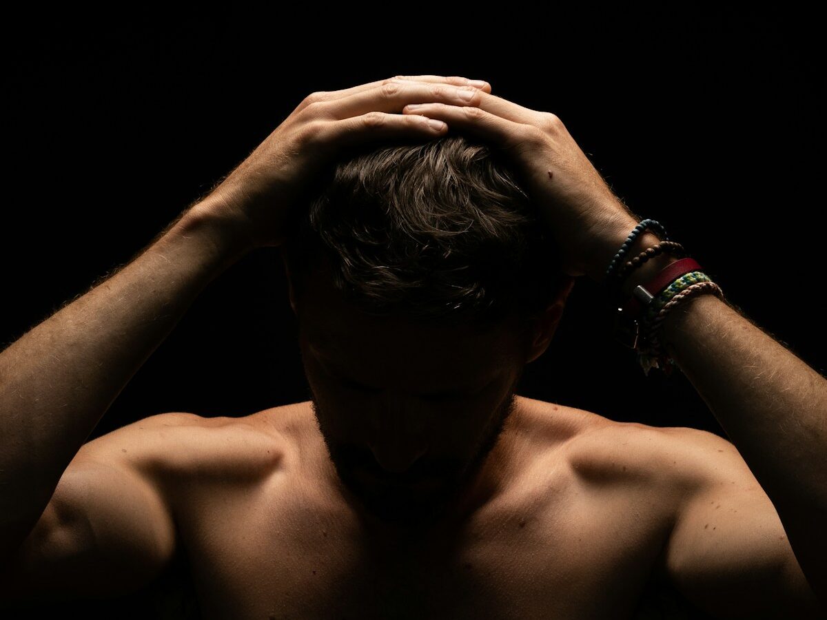 a person with the head in the hands