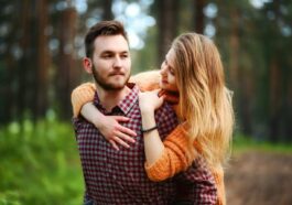 woman on man's back