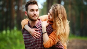 woman on man's back