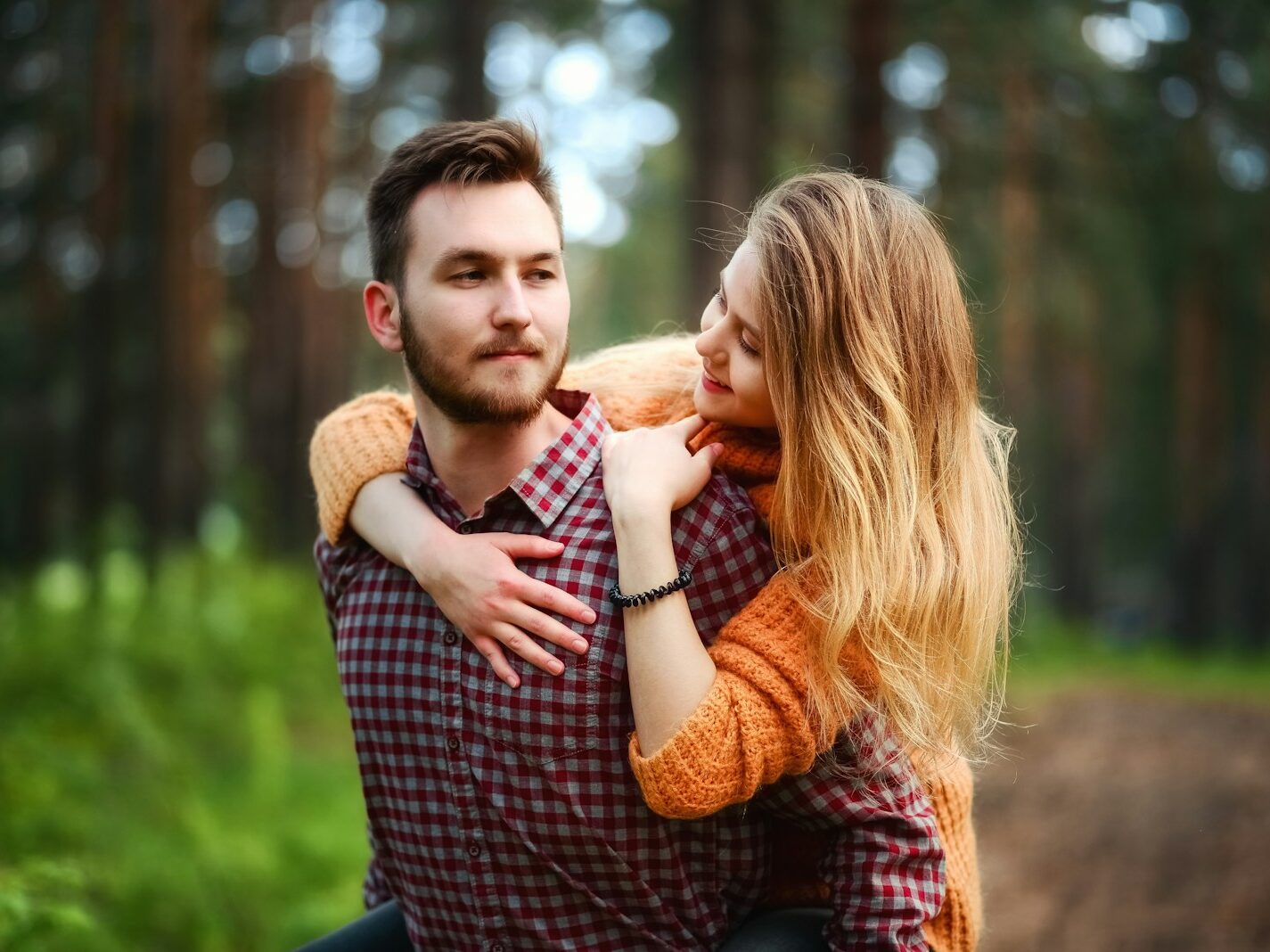 woman on man's back