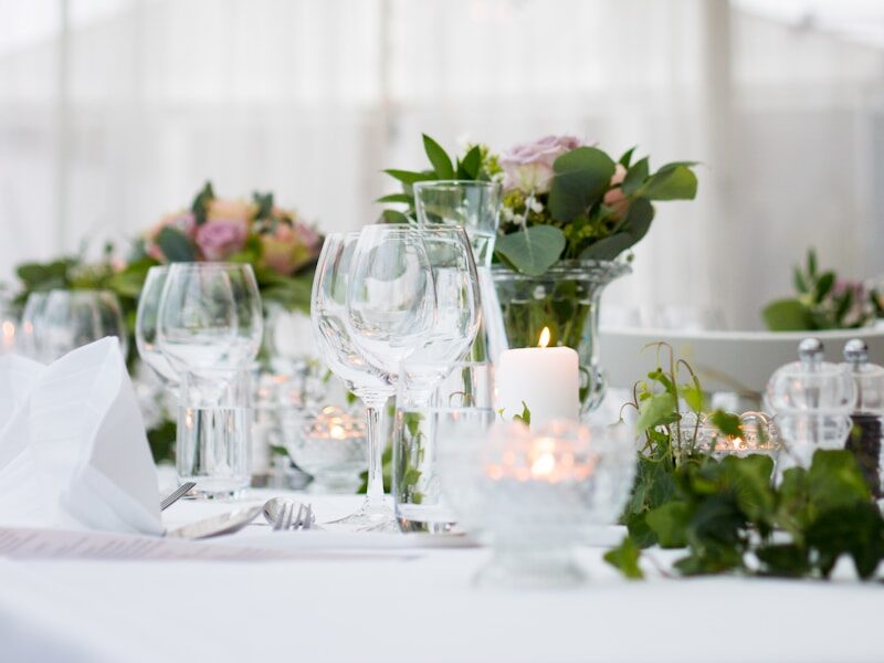 clear long-stem wine glasses on table