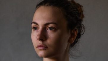 a woman with a straight face