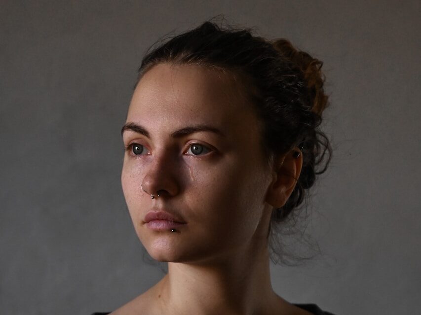 a woman with a straight face