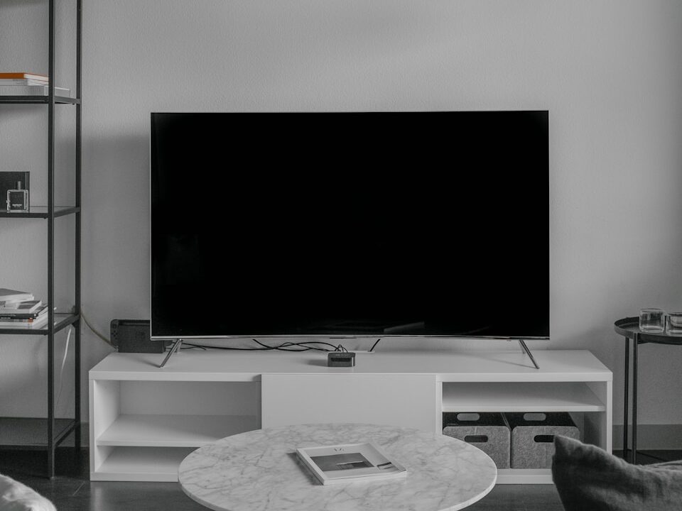 flat screen TV displaying black screen