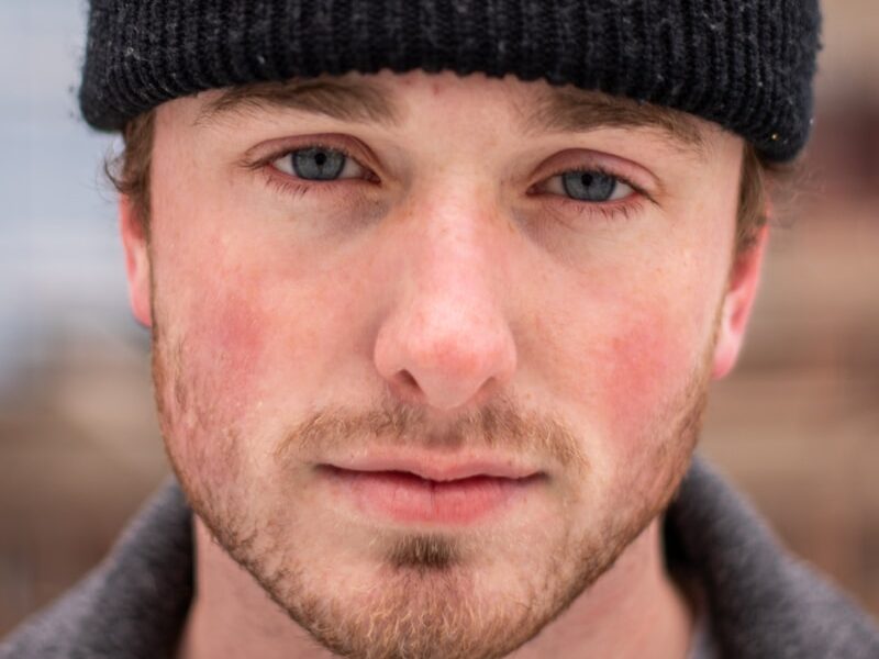 man in black knit cap