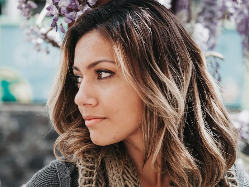 woman wearing gray scarf