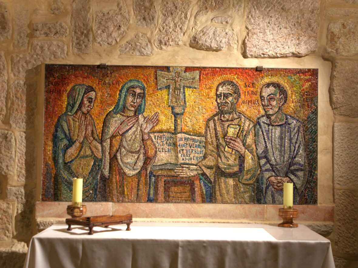 a painting of three people sitting at a table