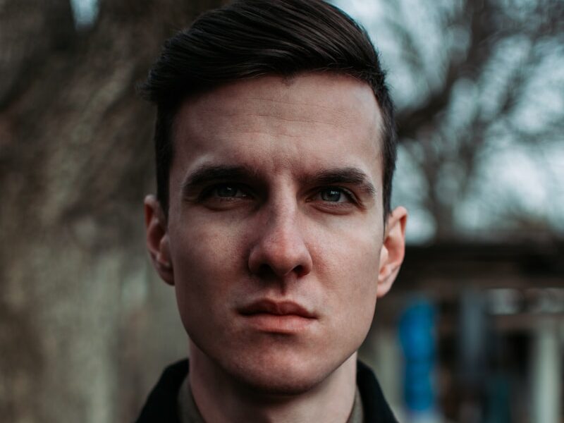 man wearing black button-down shirt