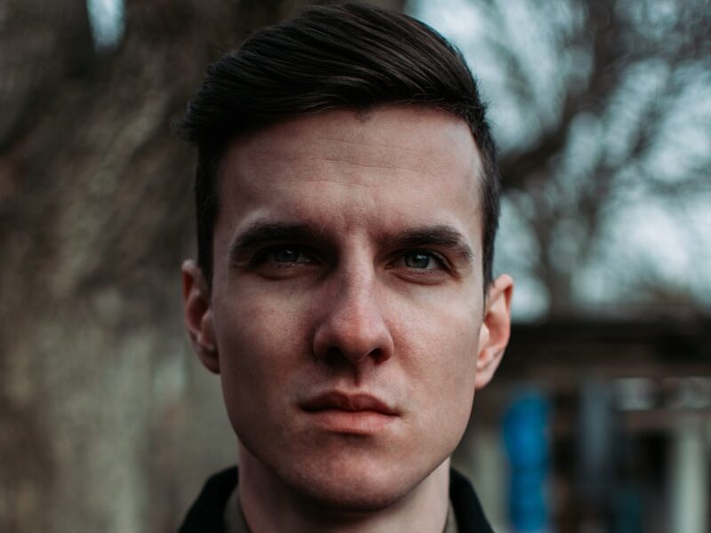 man wearing black button-down shirt