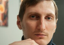 man in black and gray jacket