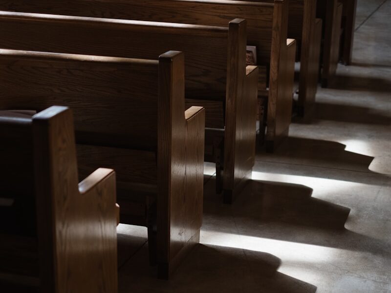 brown wooden pew bench