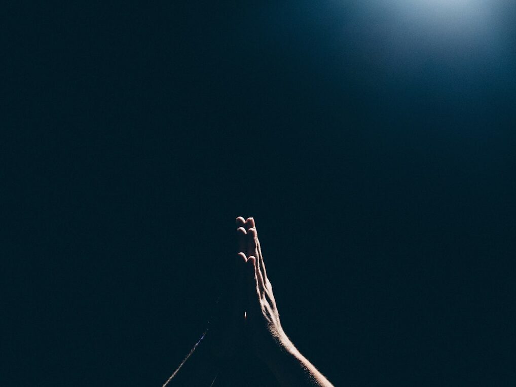 person raising arms
