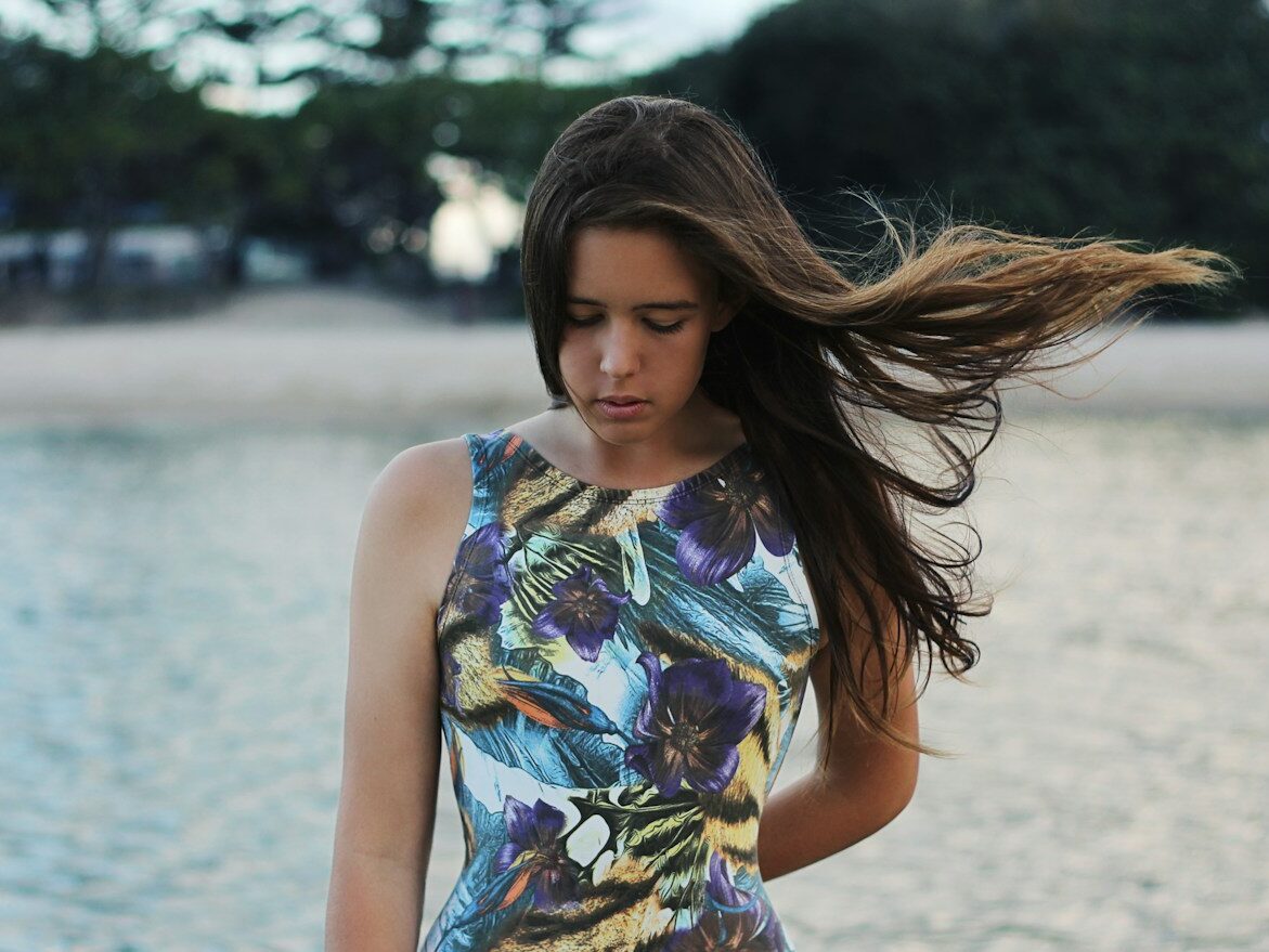 women's black, white, and yellow sleeveless swimsuit