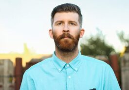 man in blue crew neck shirt