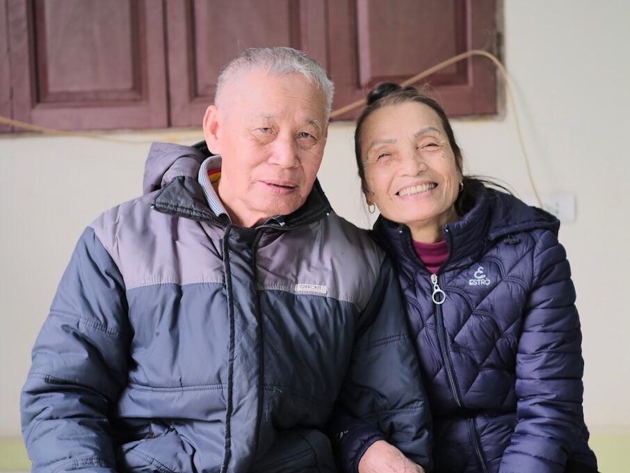 A man and a woman sitting next to each other