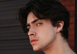 topless man with black hair