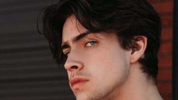 topless man with black hair