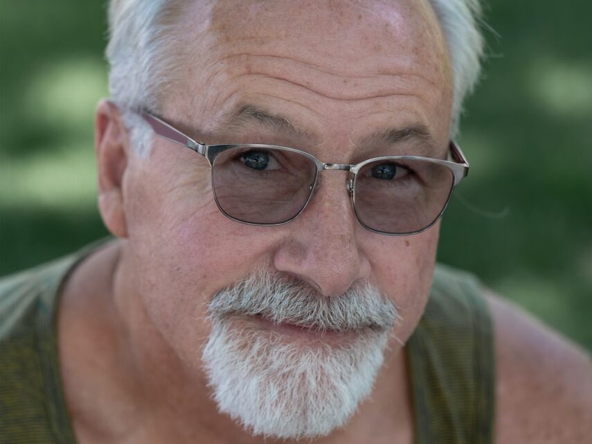 a man with a white beard wearing sunglasses