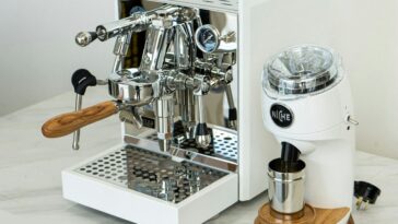 a coffee machine sitting on top of a white counter