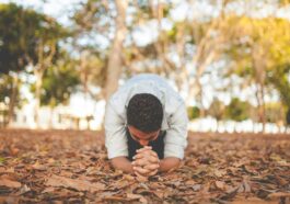 man kneeling