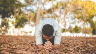 man kneeling