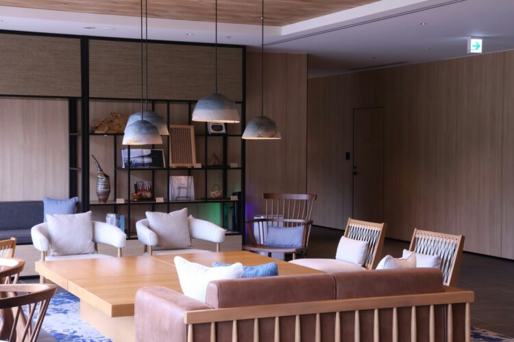 A living room filled with furniture and a wooden table