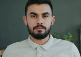 Man with beard looking directly at the camera.