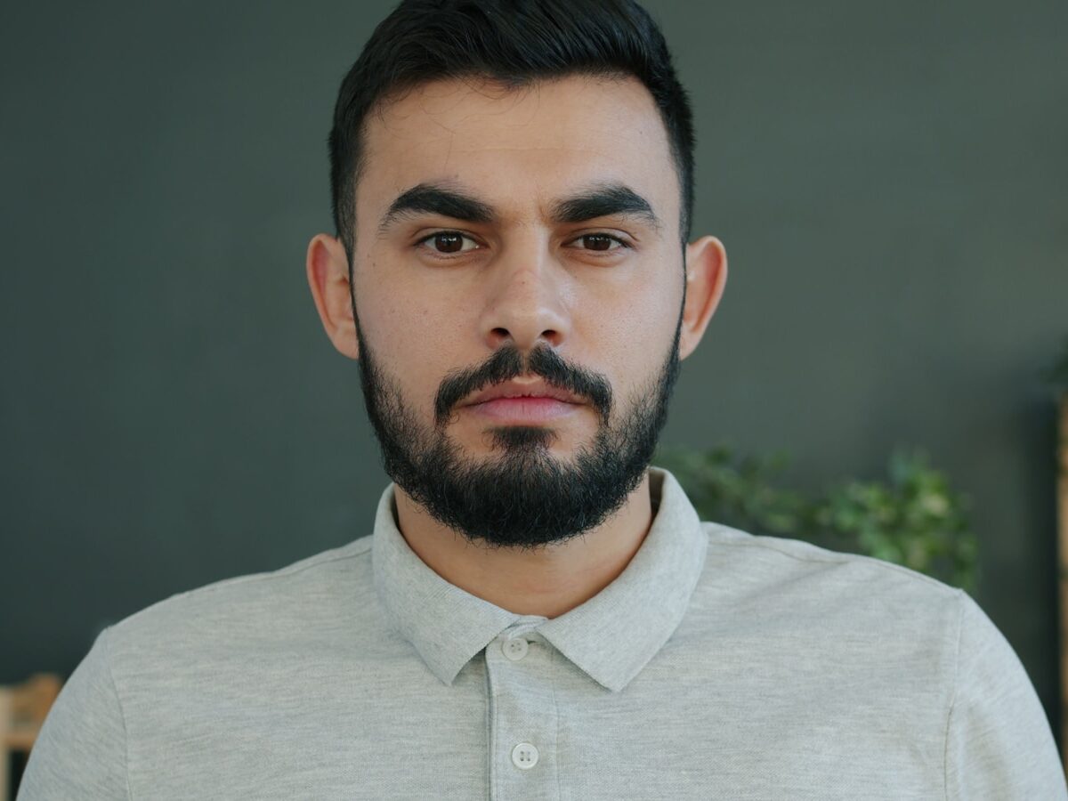 Man with beard looking directly at the camera.