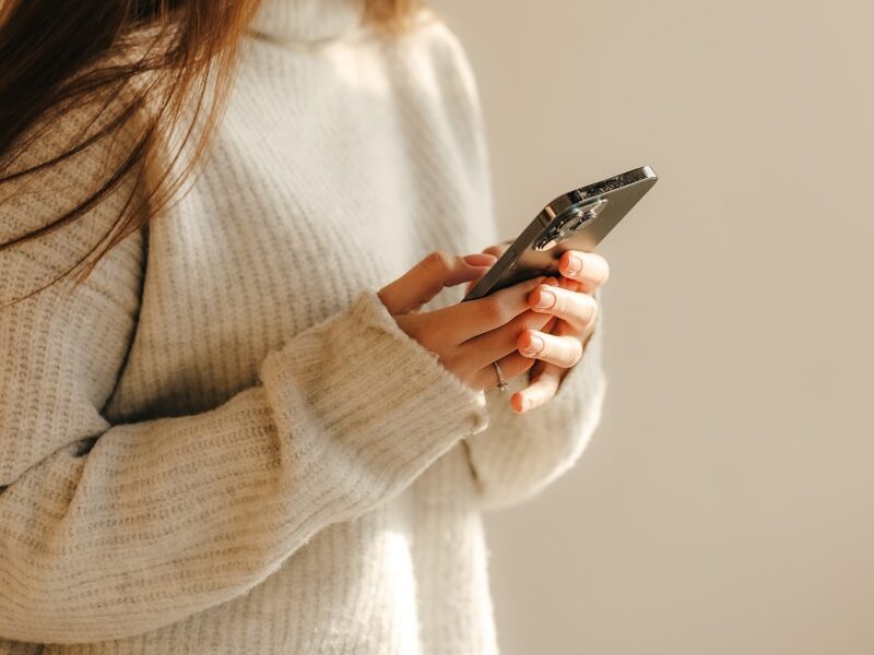 a woman looking at her phone