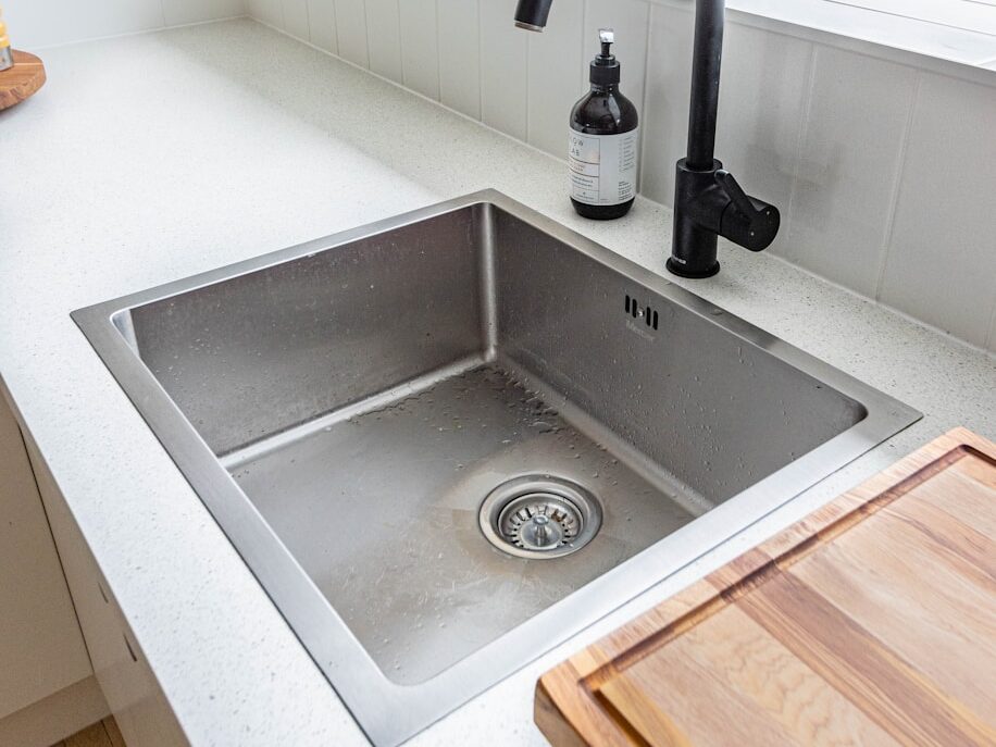 stainless steel sink with faucet