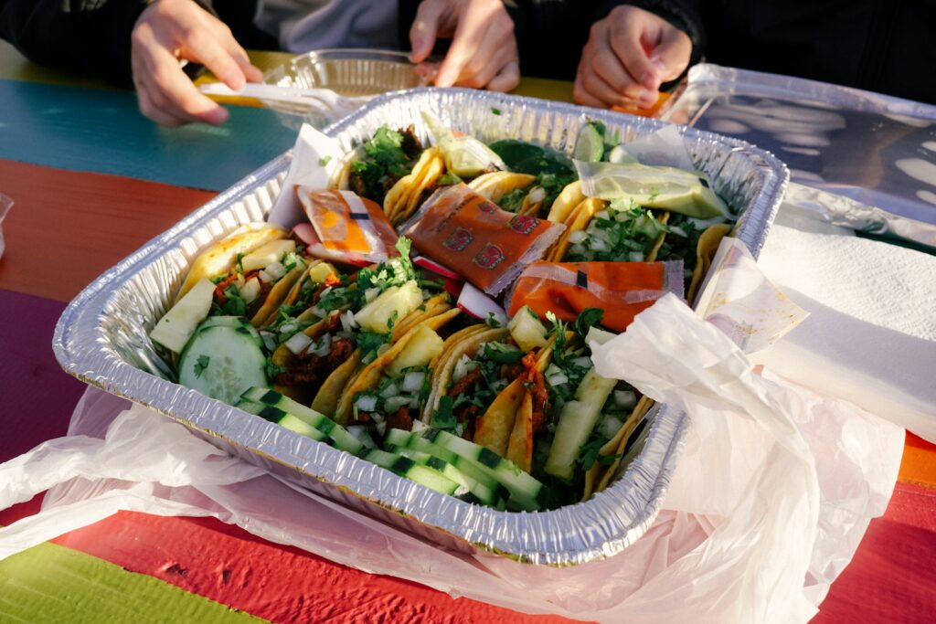 A tray of food sitting on top of a table