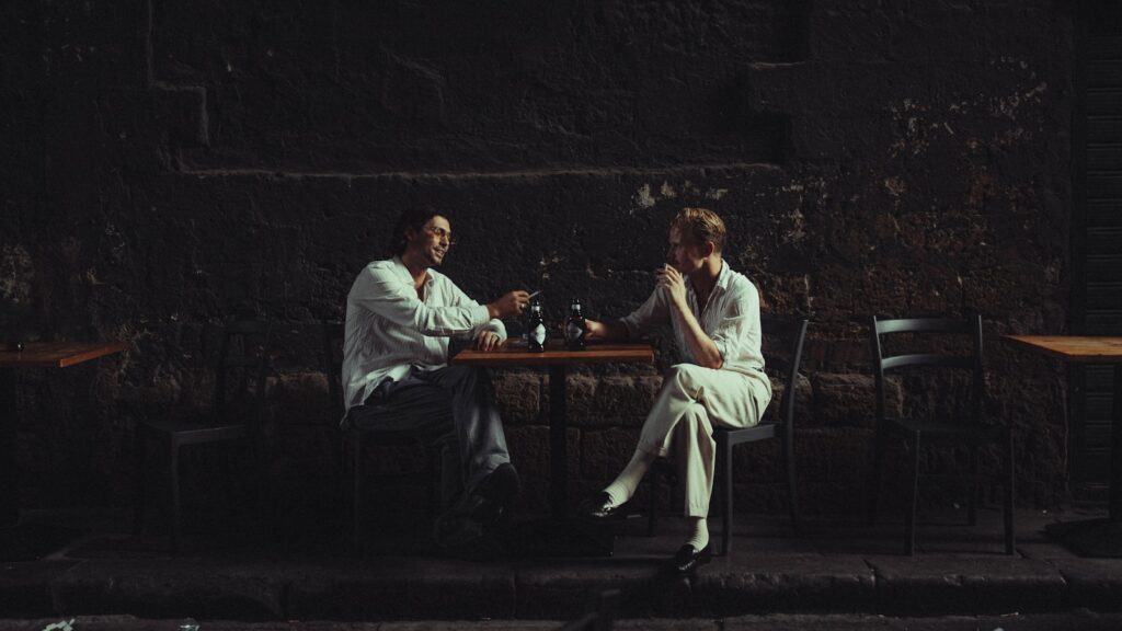 a couple of people sitting at a table