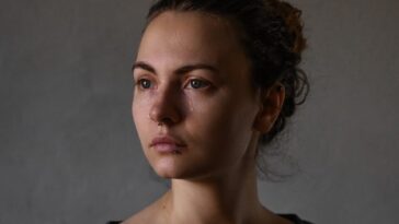 a woman with a straight face