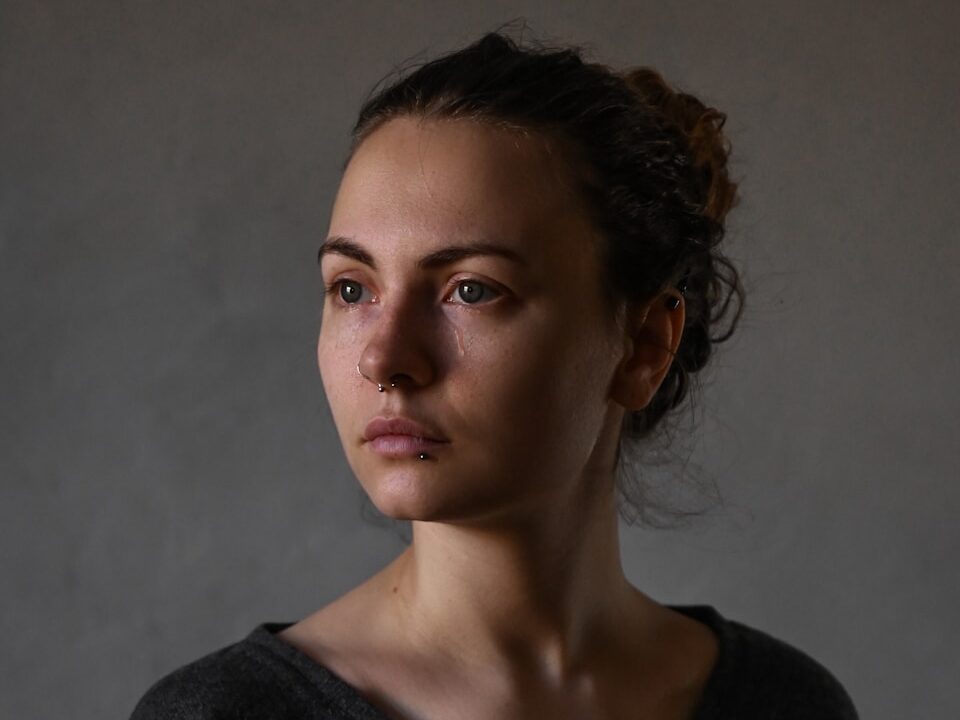 a woman with a straight face