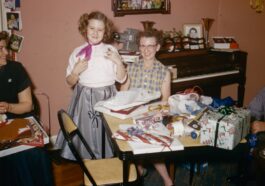 a group of people sitting around a table