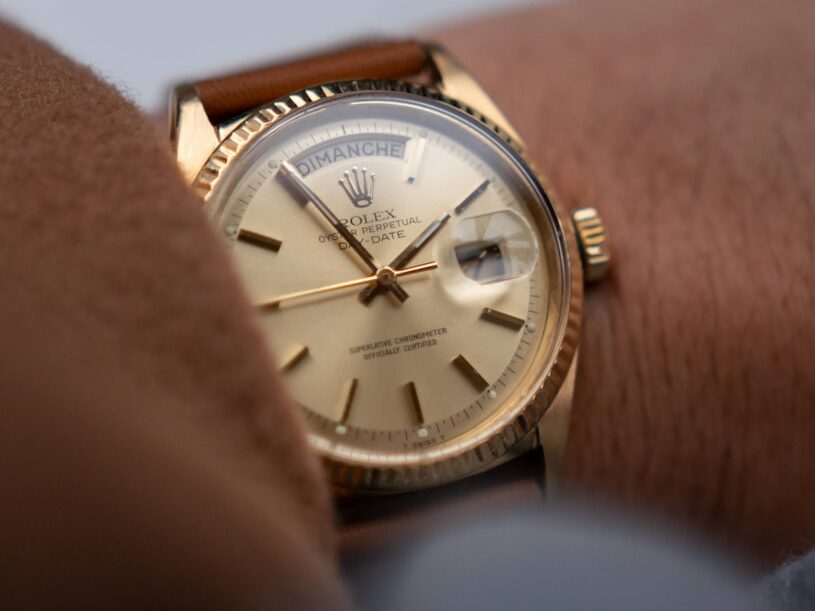 a person wearing a watch on their wrist
