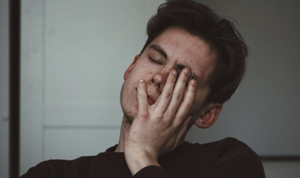 man wearing black crew-neck top
