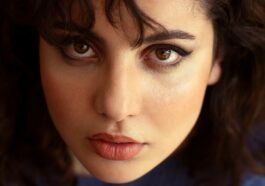 a close up of a woman with dark hair