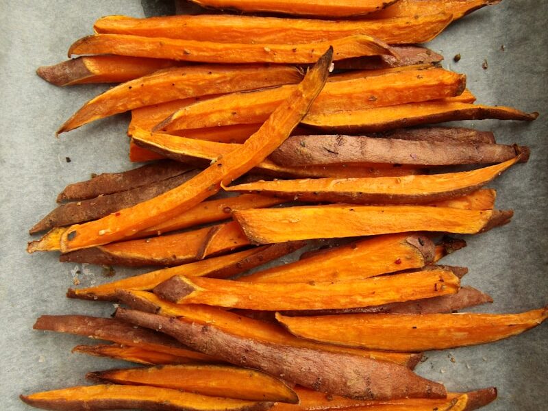 sliced carrots on gray surface