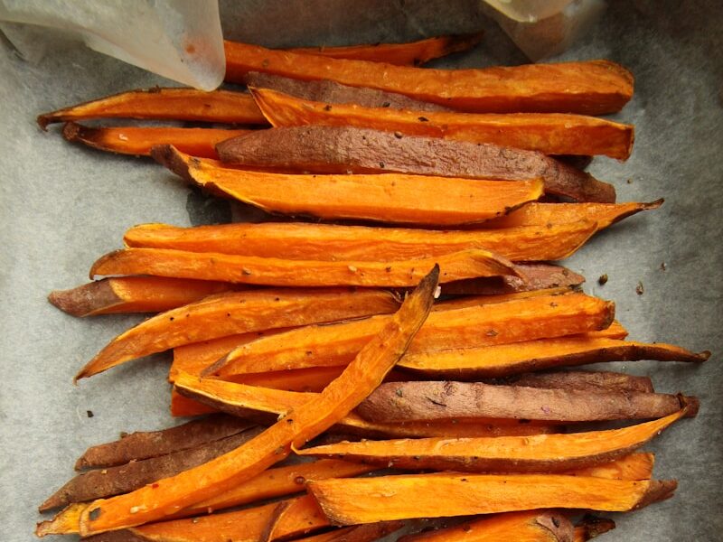 sliced carrots on gray surface