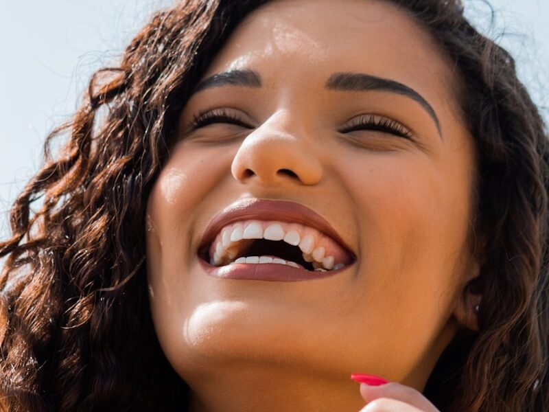 woman with brown hair smiling