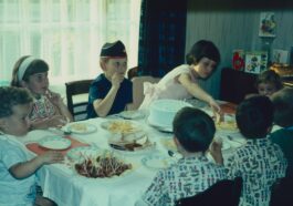 a group of people eating at a table