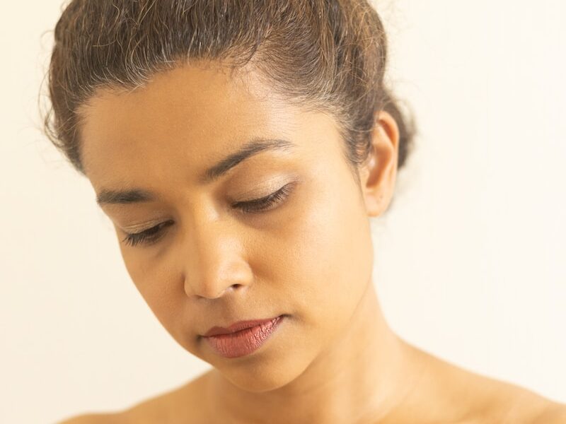 topless boy with brown eyes