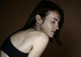 woman in black tank top